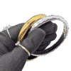 Glossy Goldtone & Faceted Silvertone Bangles Pair 2⅞ Glossy Goldtone & Faceted Silvertone Bangles Pair 2⅞