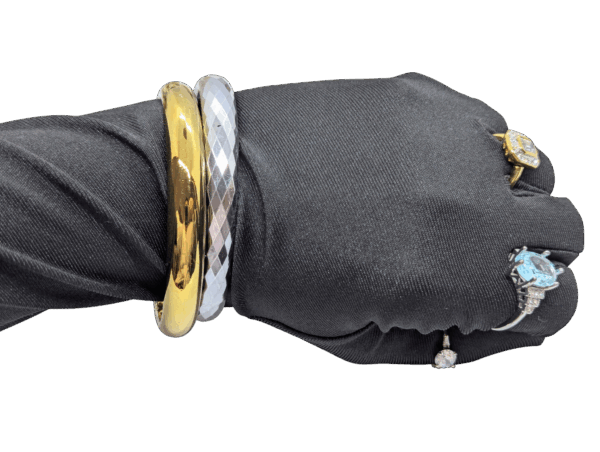 Glossy Goldtone & Faceted Silvertone Bangles Pair 2⅞ Glossy Goldtone & Faceted Silvertone Bangles Pair 2⅞