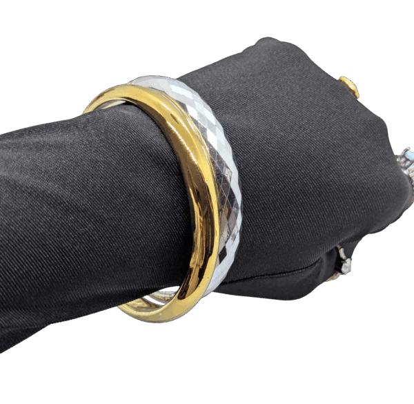 Glossy Goldtone & Faceted Silvertone Bangles Pair 2⅞ Glossy Goldtone & Faceted Silvertone Bangles Pair 2⅞