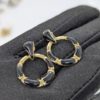 Gold-Tone Black Enamel Snake Hoop Earrings – Contemporary