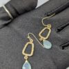 Gold-Tone Drop Earrings with Light Green Faux Stone