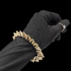 Goldtone Spike Stretch Bracelet – Punk-Inspired Statement Piece Goldtone Spike Stretch Bracelet – Punk-Inspired Statement Piece